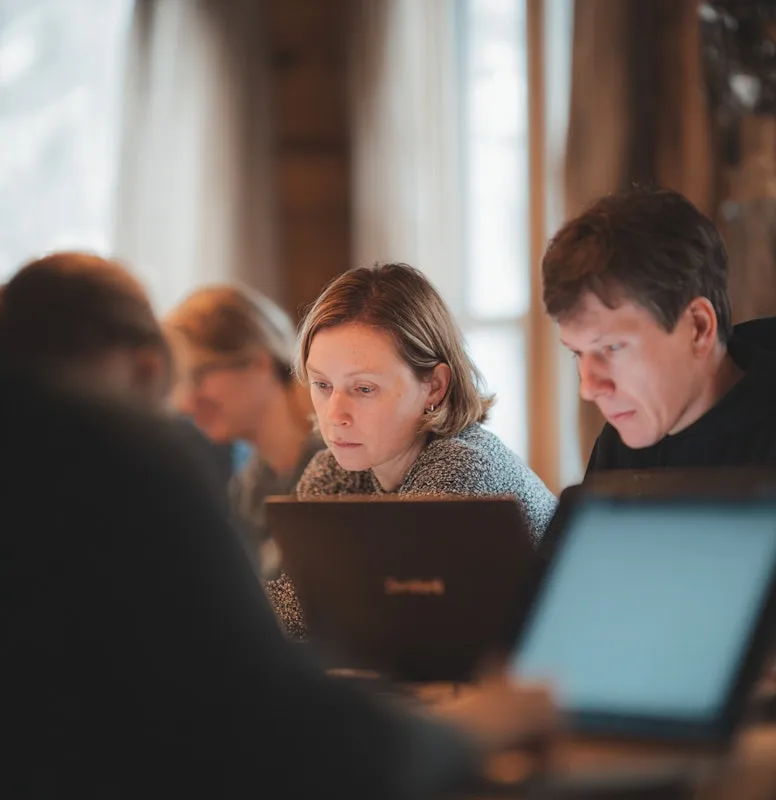 Markdown file on a screen next to a polished website.